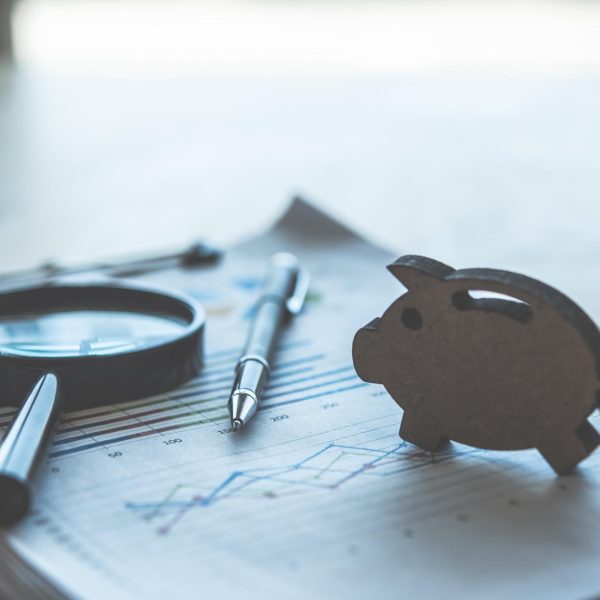 close-up-graph-magnifying-glass-table